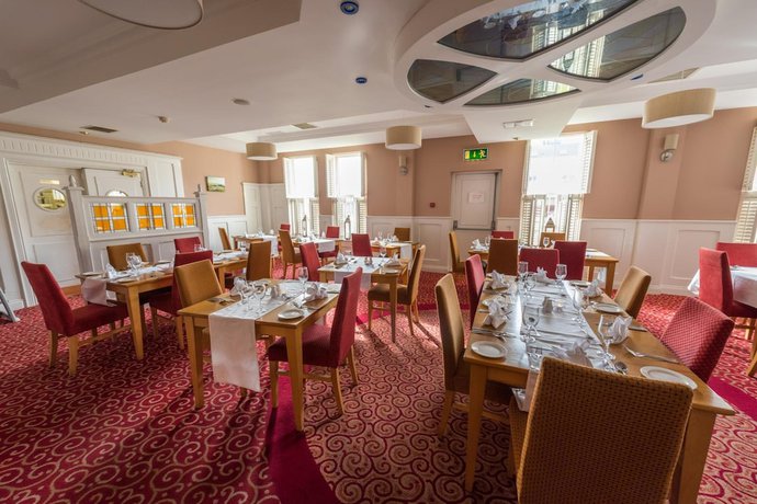 Imagen del bar/restaurante del Hotel Downings Bay. Foto 3