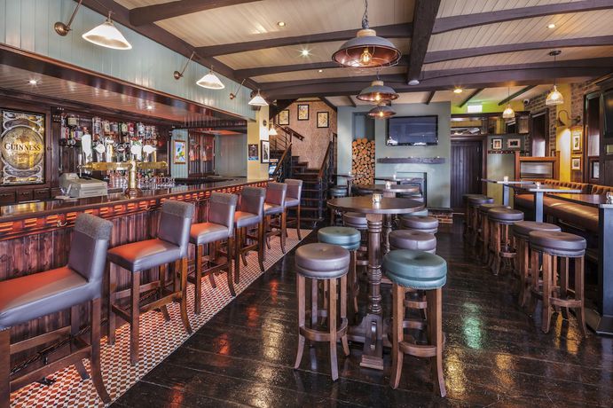 Imagen del bar/restaurante del Hotel Downings Bay. Foto 5