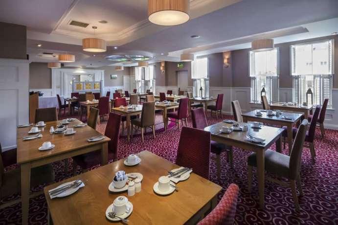 Imagen del bar/restaurante del Hotel Downings Bay. Foto 10