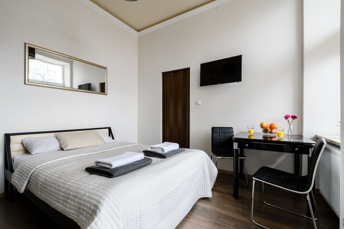 Imagen de la habitación del Hotel Downtown Apartments, Varsovia. Foto 2