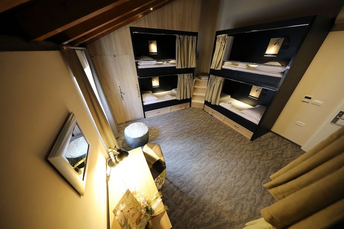 Imagen de la habitación del Hotel Downtown Boutique Hostel. Foto 6