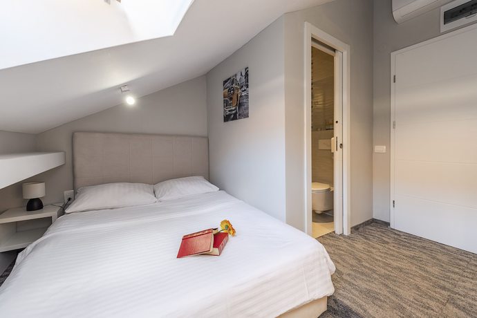 Imagen de la habitación del Hotel Downtown Boutique Hostel. Foto 7