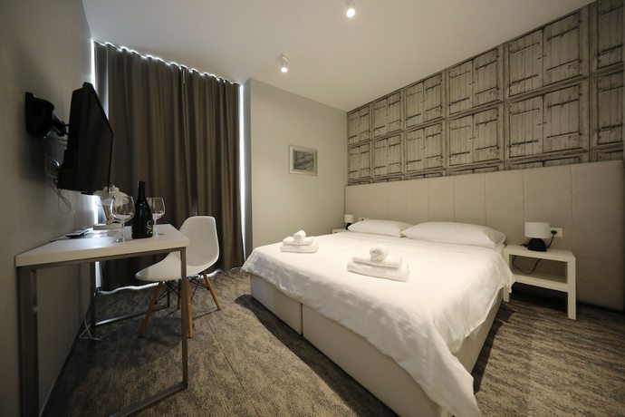 Imagen de la habitación del Hotel Downtown Boutique Hostel. Foto 11