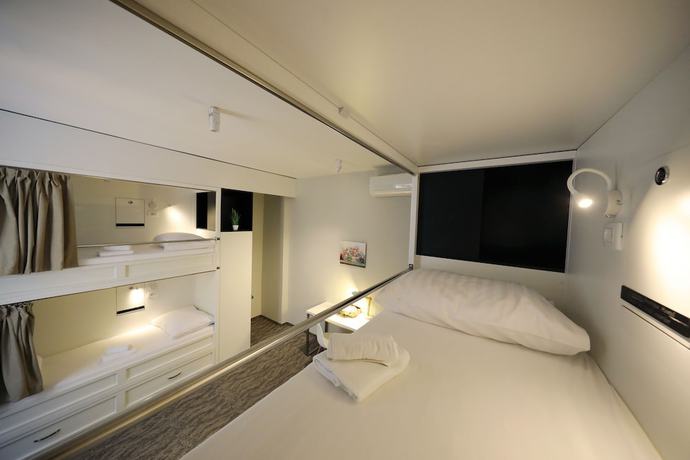 Imagen de la habitación del Hotel Downtown Boutique Hostel. Foto 13