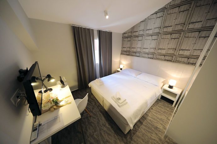 Imagen de la habitación del Hotel Downtown Boutique Hostel. Foto 16