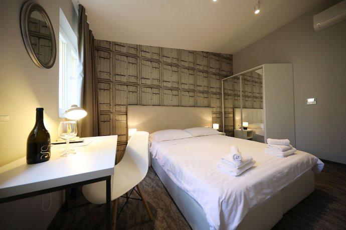 Imagen de la habitación del Hotel Downtown Boutique Hostel. Foto 17