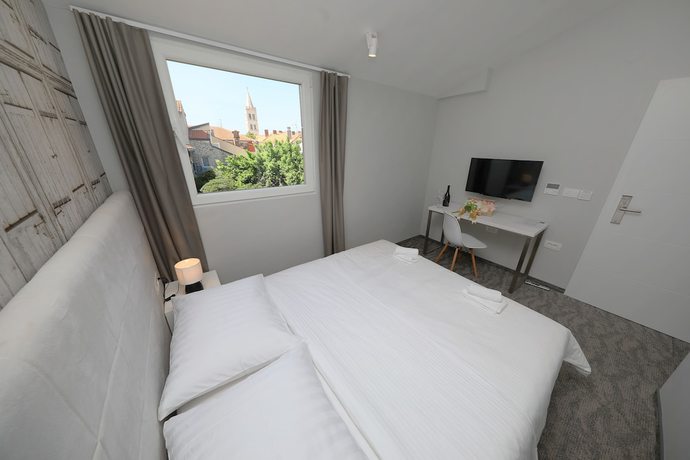 Imagen de la habitación del Hotel Downtown Boutique Hostel. Foto 20