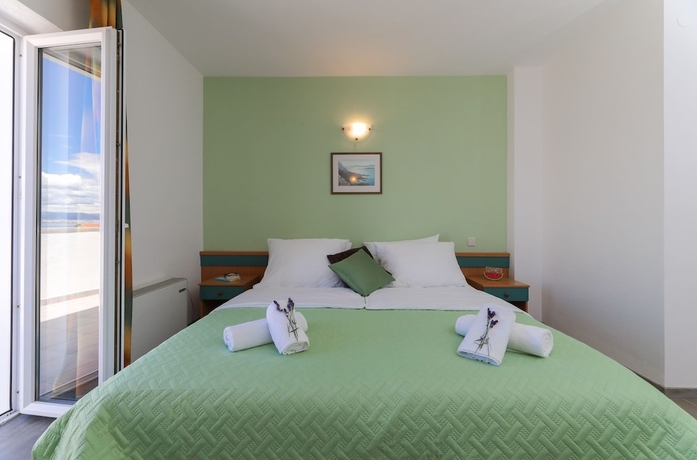 Imagen de la habitación del Hotel Downtown Private Rooms. Foto 9