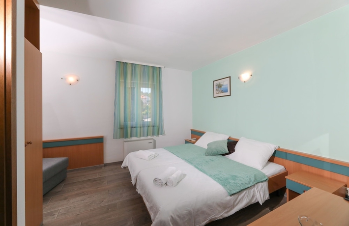 Imagen de la habitación del Hotel Downtown Private Rooms. Foto 11