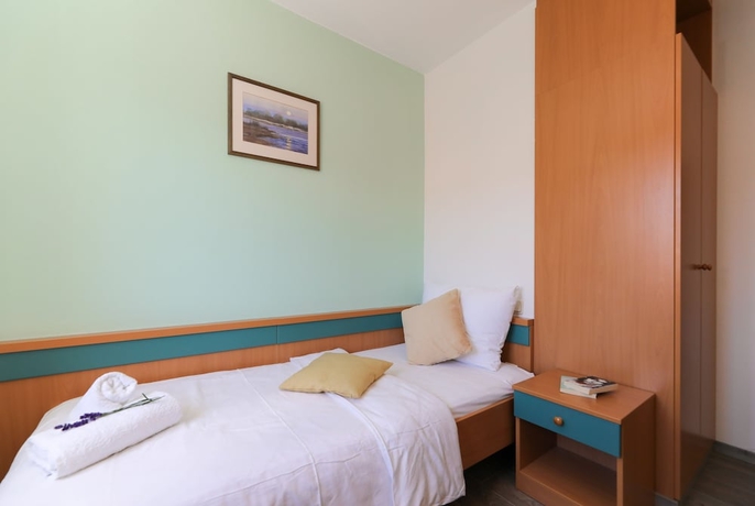 Imagen de la habitación del Hotel Downtown Private Rooms. Foto 13