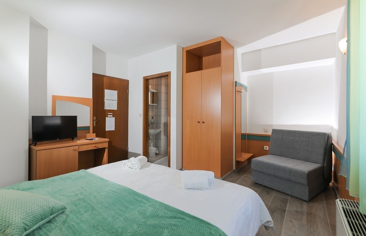 Imagen de la habitación del Hotel Downtown Private Rooms. Foto 16