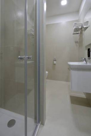 Imagen de la habitación del Hotel Downtown Suites Belohorska. Foto 3
