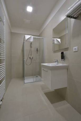 Imagen de la habitación del Hotel Downtown Suites Belohorska. Foto 4