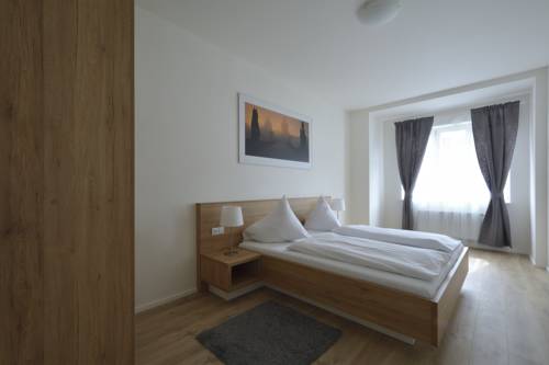 Imagen de la habitación del Hotel Downtown Suites Belohorska. Foto 7