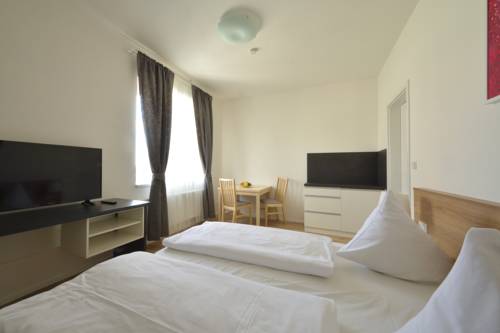 Imagen de la habitación del Hotel Downtown Suites Belohorska. Foto 16