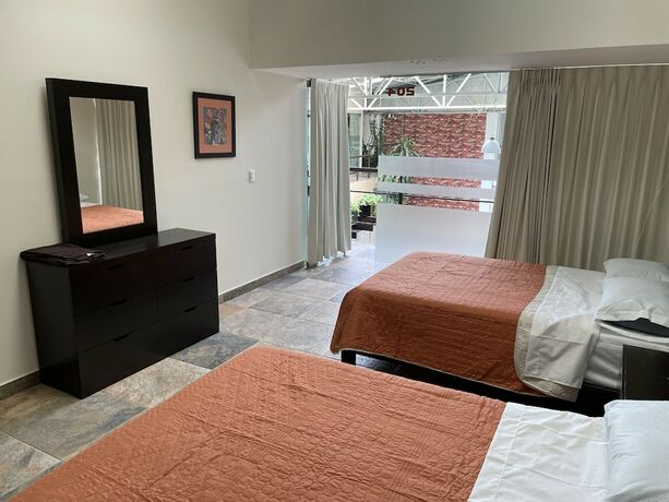 Imagen de la habitación del Hotel Downtown Treasure Place. Foto 12