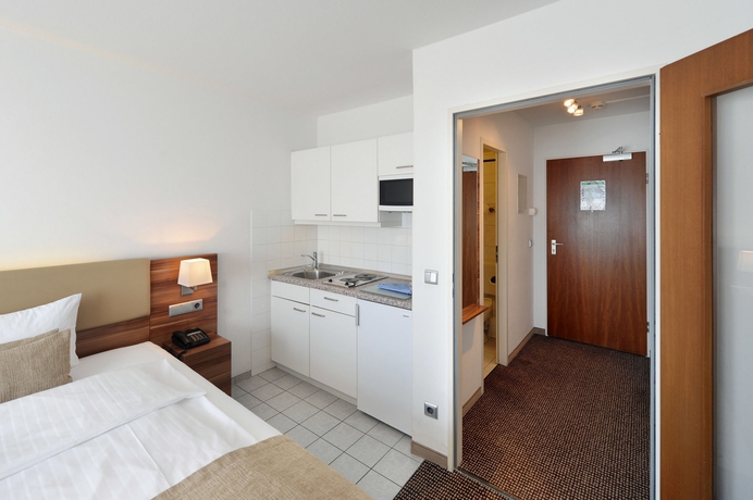 Imagen de la habitación del Hotel Downtown Vi Vadi. Foto 13