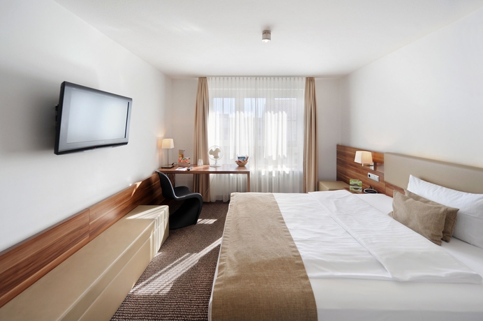 Imagen de la habitación del Hotel Downtown Vi Vadi. Foto 14