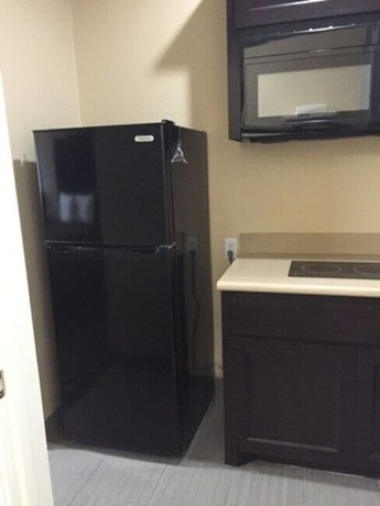 Imagen de la habitación del Hotel Downtowner Inns. Foto 13