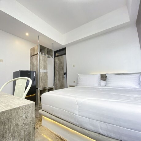 Imagen de la habitación del Hotel Dparagon Malioboro. Foto 13