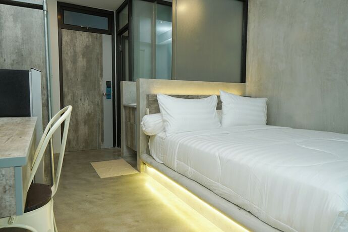 Imagen de la habitación del Hotel Dparagon Menteng. Foto 18
