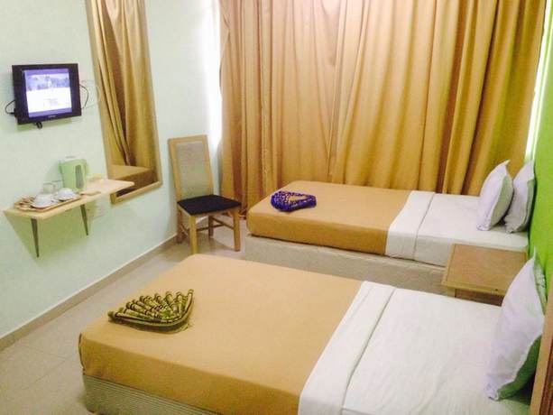 Imagen de la habitación del Hotel D'pearl. Foto 13