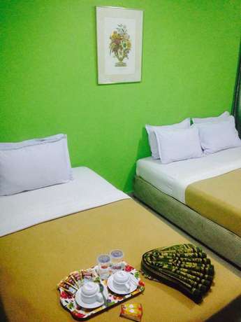 Imagen de la habitación del Hotel D'pearl. Foto 16