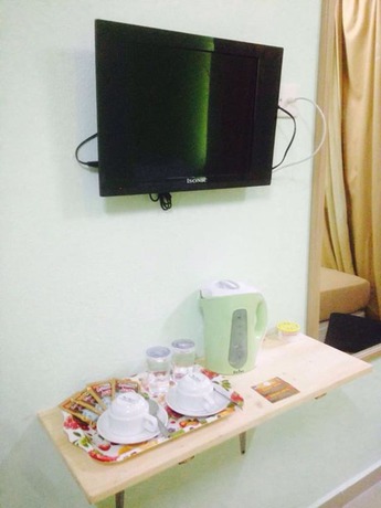 Imagen de la habitación del Hotel D'pearl. Foto 19