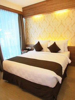 Imagen de la habitación del Hotel D'primahotel Mega Kuningan. Foto 10