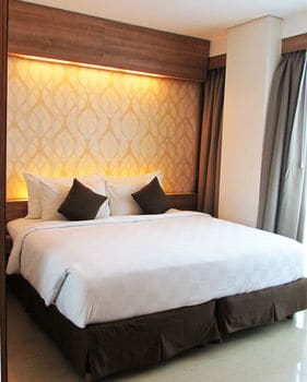 Imagen de la habitación del Hotel D'primahotel Mega Kuningan. Foto 12