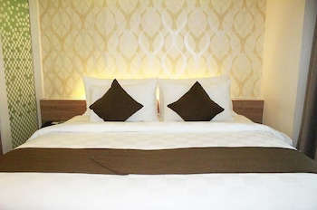 Imagen de la habitación del Hotel D'primahotel Mega Kuningan. Foto 14