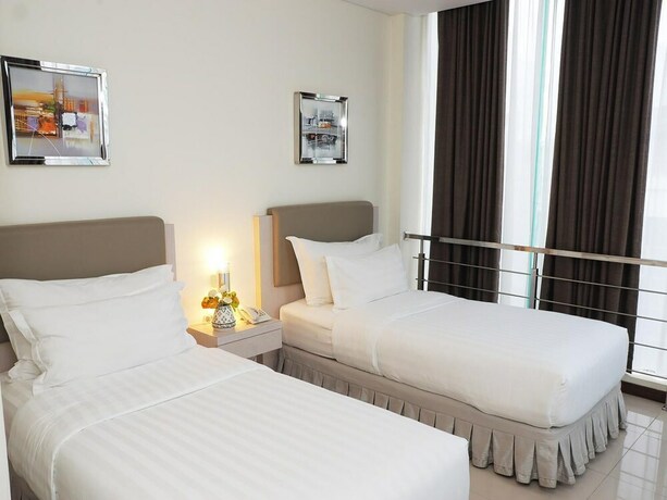 Imagen de la habitación del Hotel D'primahotel Melawai Blok M. Foto 22