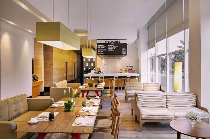 Imagen del bar/restaurante del Hotel D'primahotel Tangerang. Foto 1