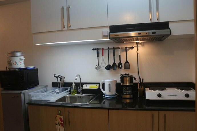 Imagen de la habitación del Hotel Dr Calayan S Cozy Wind Residences Tagaytay Taal Vi. Foto 30