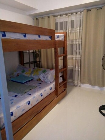 Imagen de la habitación del Hotel Dr Calayan S Cozy Wind Residences Tagaytay Taal Vi. Foto 31