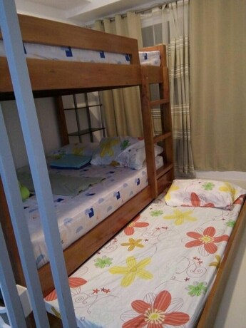 Imagen de la habitación del Hotel Dr Calayan S Cozy Wind Residences Tagaytay Taal Vi. Foto 33