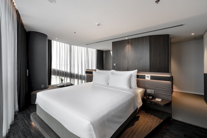 Imagen de la habitación del Hotel Draco and Suites. Foto 12