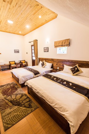Imagen de la habitación del Hotel Dragon Dalat Villa. Foto 5