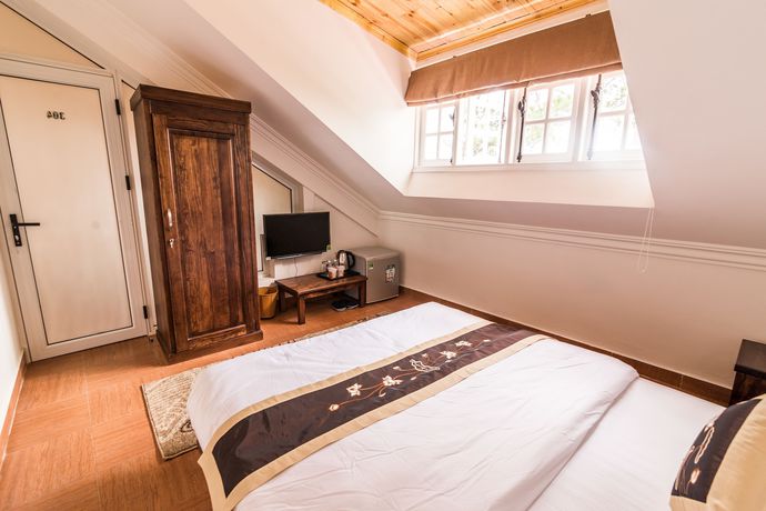 Imagen de la habitación del Hotel Dragon Dalat Villa. Foto 6