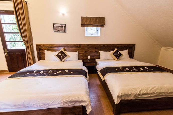 Imagen de la habitación del Hotel Dragon Dalat Villa. Foto 8