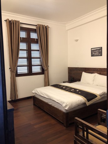 Imagen de la habitación del Hotel Dragon Dalat Villa. Foto 10