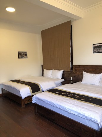 Imagen de la habitación del Hotel Dragon Dalat Villa. Foto 12