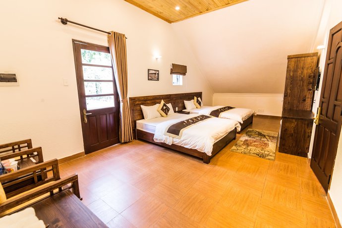 Imagen de la habitación del Hotel Dragon Dalat Villa. Foto 16