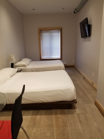 Imagen de la habitación del Hotel Dragon Gate Inn. Foto 5