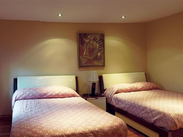 Imagen de la habitación del Hotel Dragon Gate Inn. Foto 15