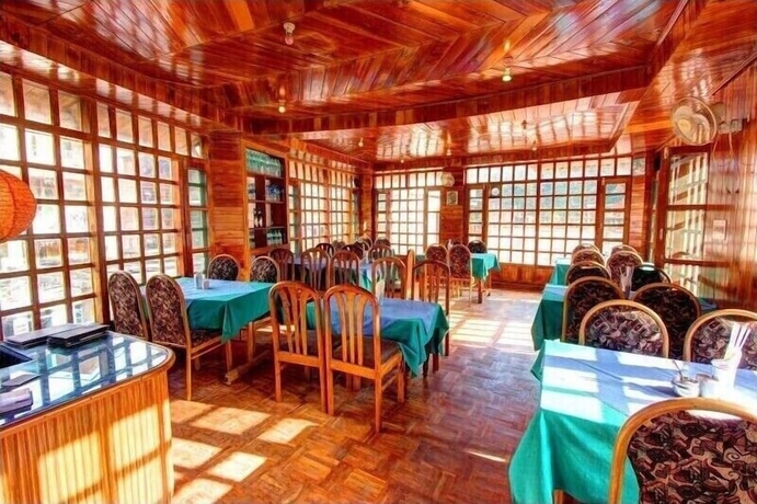 Imagen del bar/restaurante del Hotel Dragon Inn Manali. Foto 3
