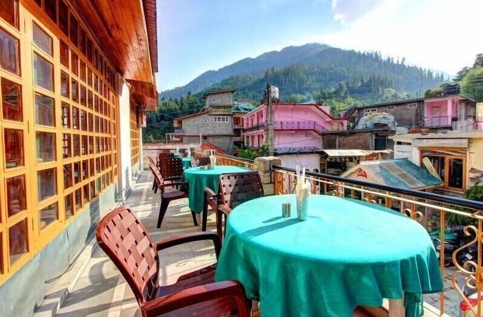 Imagen del bar/restaurante del Hotel Dragon Inn Manali. Foto 4