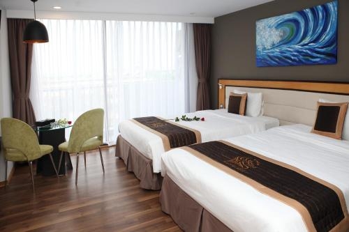 Imagen de la habitación del Hotel Dragon Sea. Foto 7