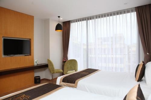 Imagen de la habitación del Hotel Dragon Sea. Foto 8