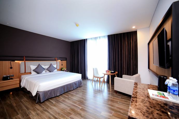 Imagen de la habitación del Hotel Dragon Style Hotel. Foto 11